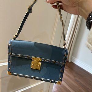 Louise Vuitton goat skin sachet,